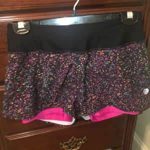 MPG shorts with spandex under neath. Size XS.